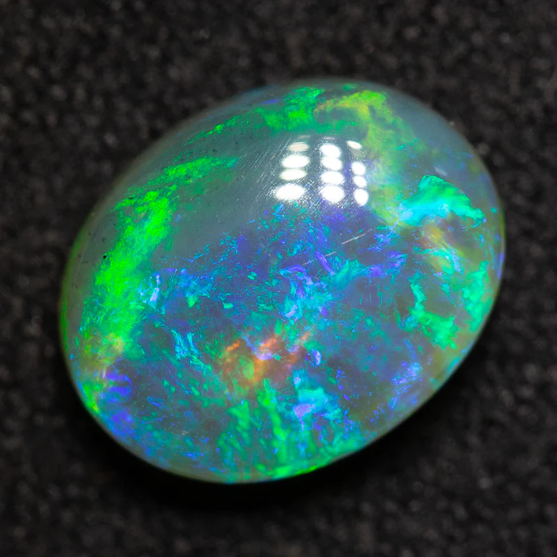 1.85 ct crystal opal 9.1x7.3x4.3mm