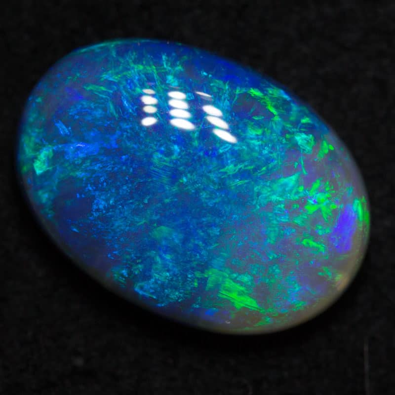 1.91 ct dark opal 10.4x7.4x3.8mm