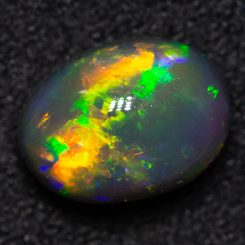 1.95 ct black opal 8.5x6.3x5.7mm