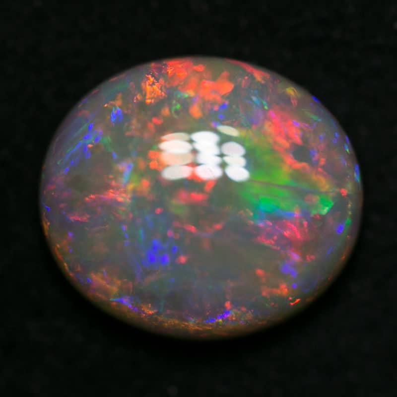 1.95 ct dark opal 9x8x3.5mm