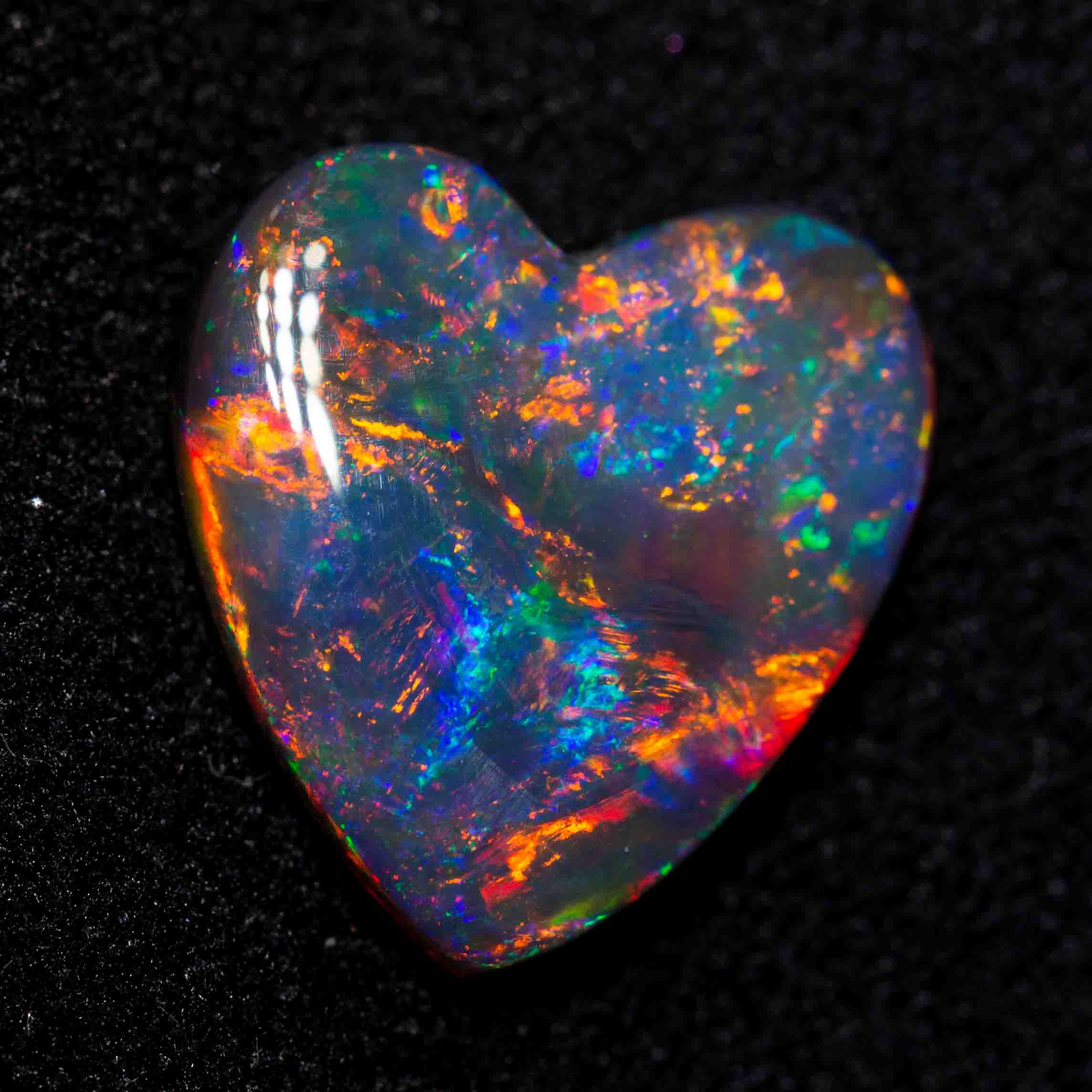 1.98 ct black opal 10.8x10.2x2.9mm