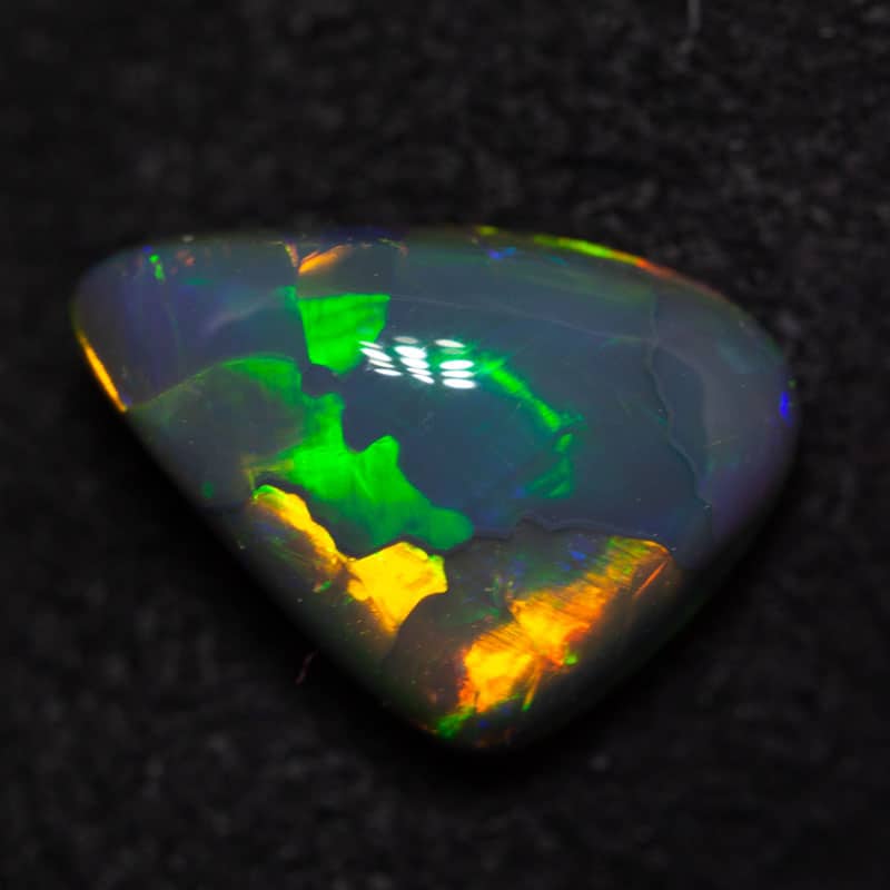 1.98 ct black opal 11x7.5x4mm