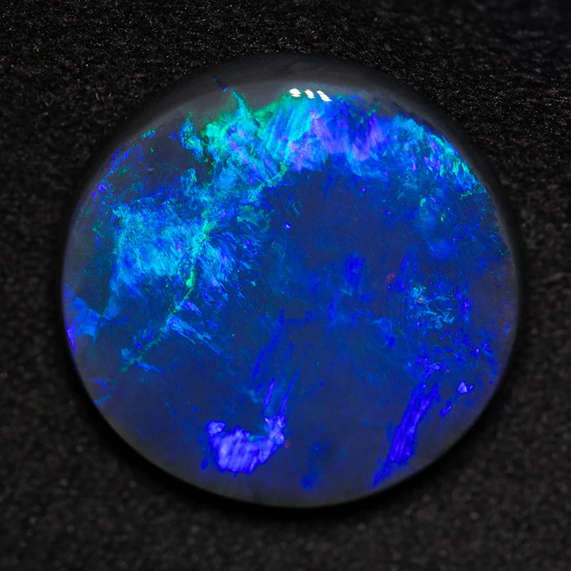 10.17 ct black opal 17.4x17.4x5.1mm