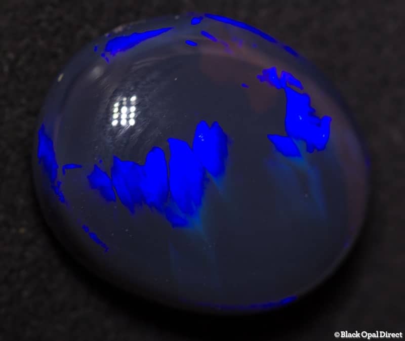 10.43 ct black opal 16x13x7.5mm