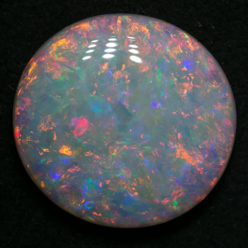10.81 ct double sided white opal 18x17x5mm