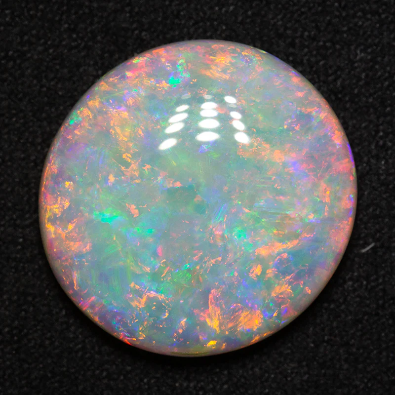 10.81 ct white opal 18x17x5 mm