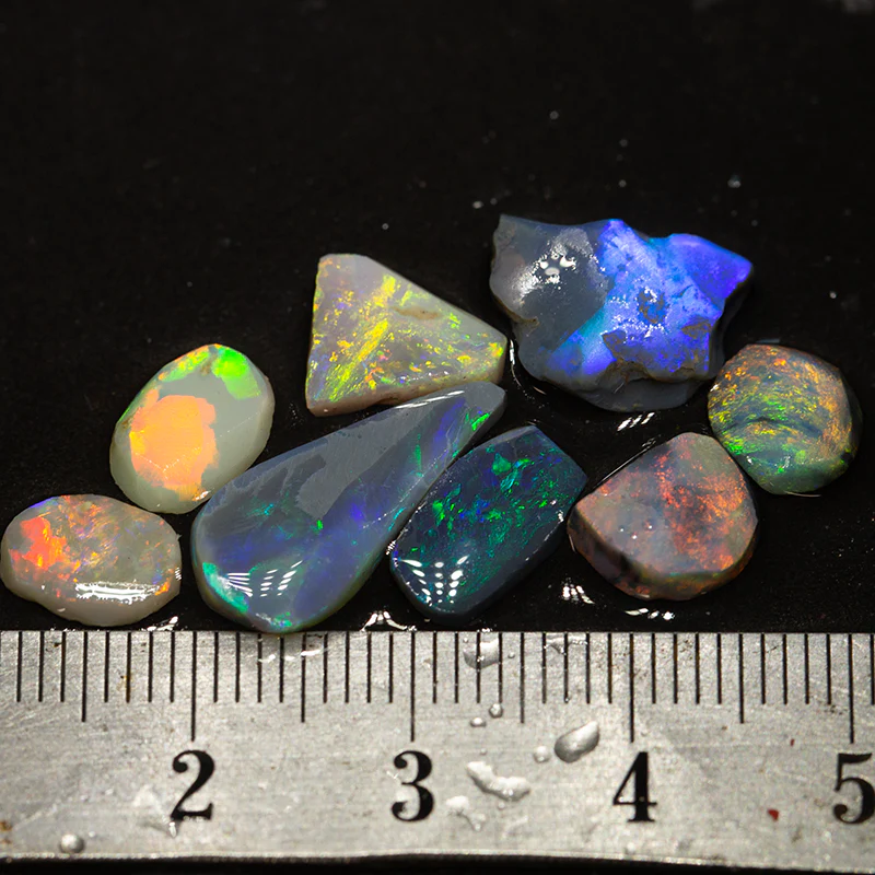 10.96 ct opal rubs parcel 8pc