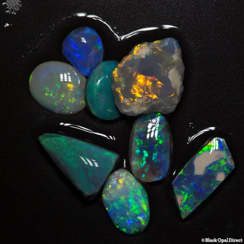 11.12 ct opal rubs 8 pieces