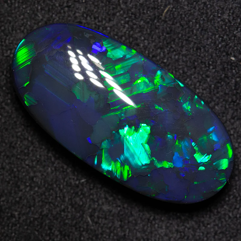 11.28 ct gem black opal 22x11x6mm