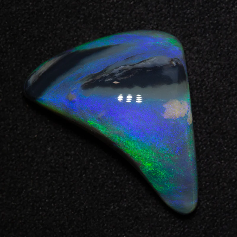 12.39 ct dark opal 22.2x14.2x8.1mm