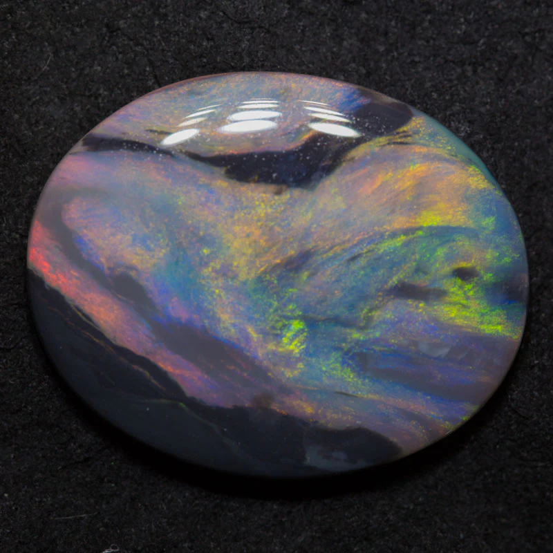 12.68 ct dark opal 23x18.6x4.5mm