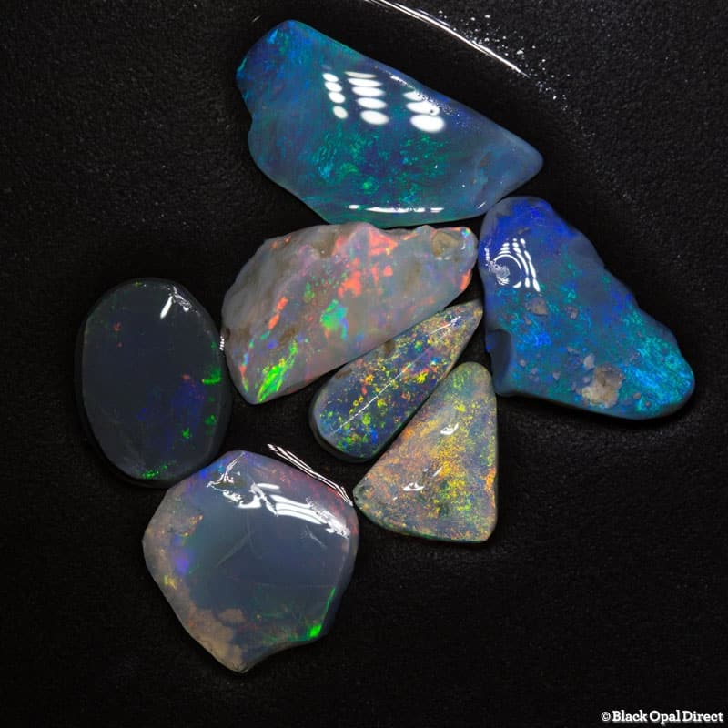 12.76 ct opal rubs 7 pieces