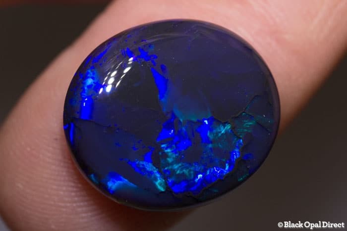13.68 ct black opal 19x16x7mm