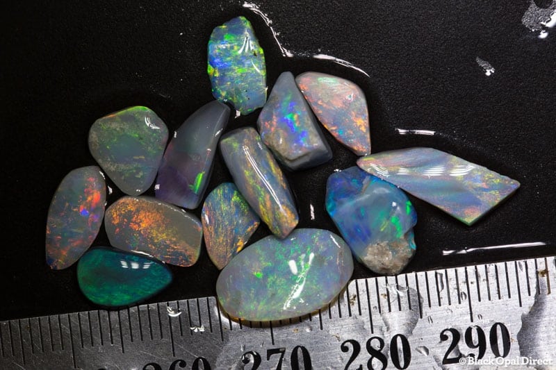 13.88 ct opal rubs 13pc