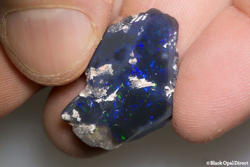13.92ct polish black raw opal 28x19x4mm