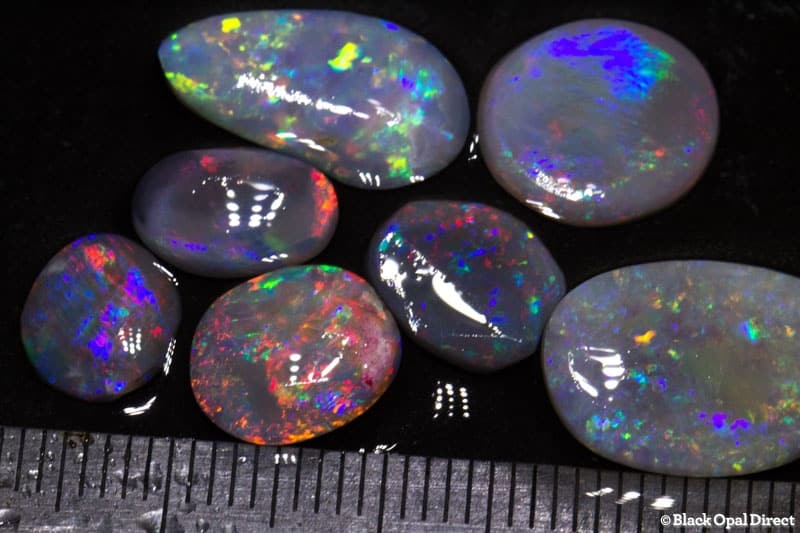 14.36 ct opal rubs 7 pieces