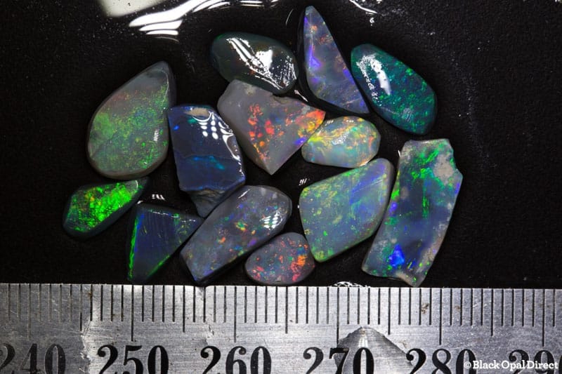 16.36 ct opal rubs 13 pieces