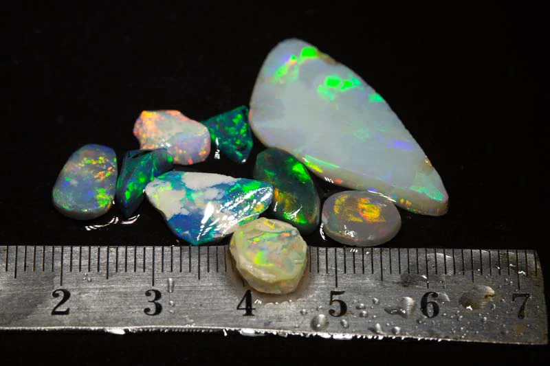 18.23 ct opal rubs 9pc