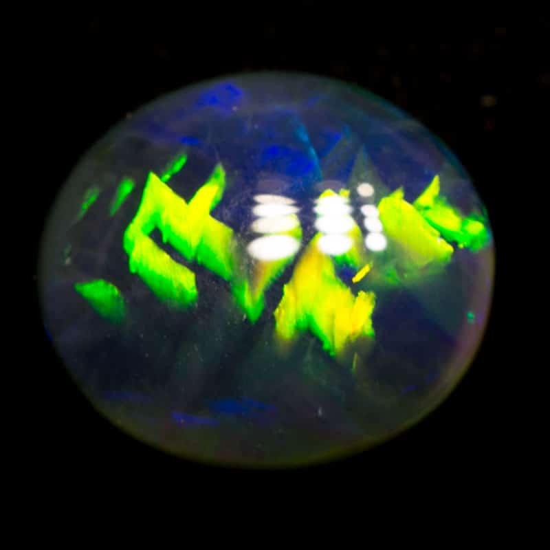 2.01 ct gem black opal with Chinese writing 9x8x4mm Slessor