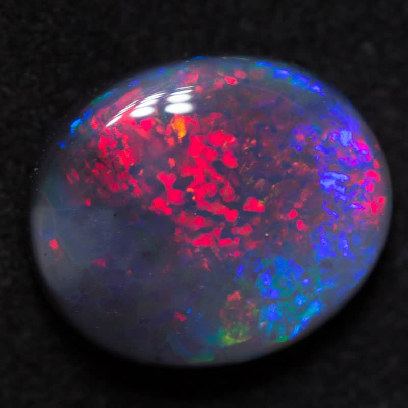 2.02 ct black opal 9.5x8x3.5mm