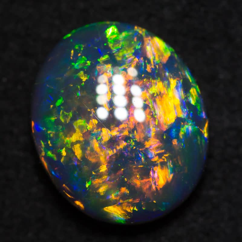 2.03 ct gem black opal 9.8x8.1x4mm