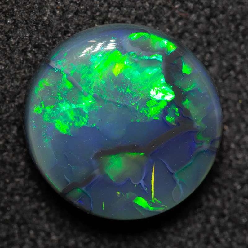 2.08 ct black opal 9.1x9.1x3.9mm