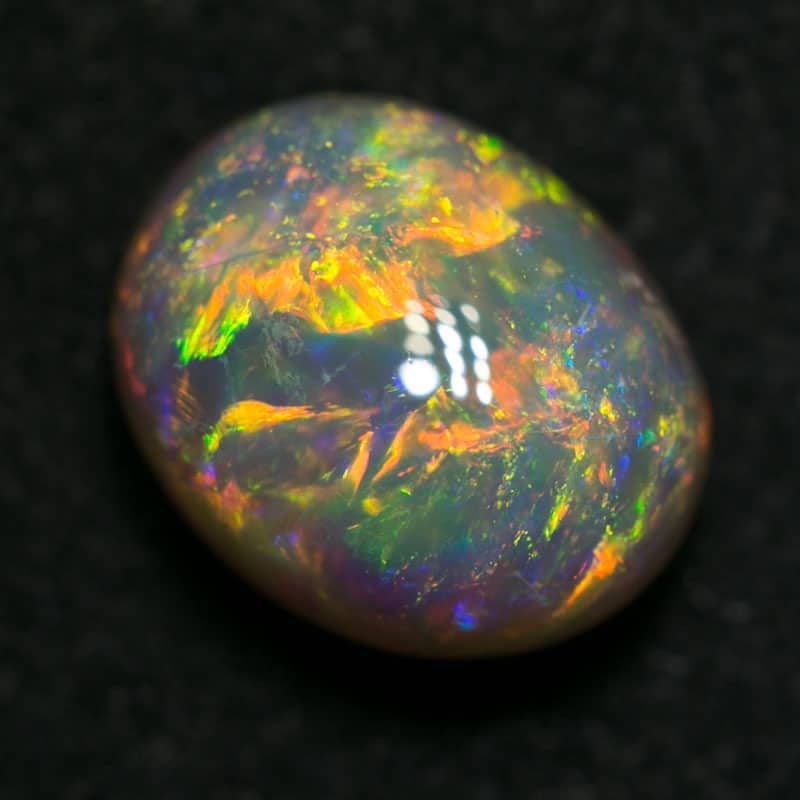 2.14 ct double sided crystal opal 8.5x7x5mm