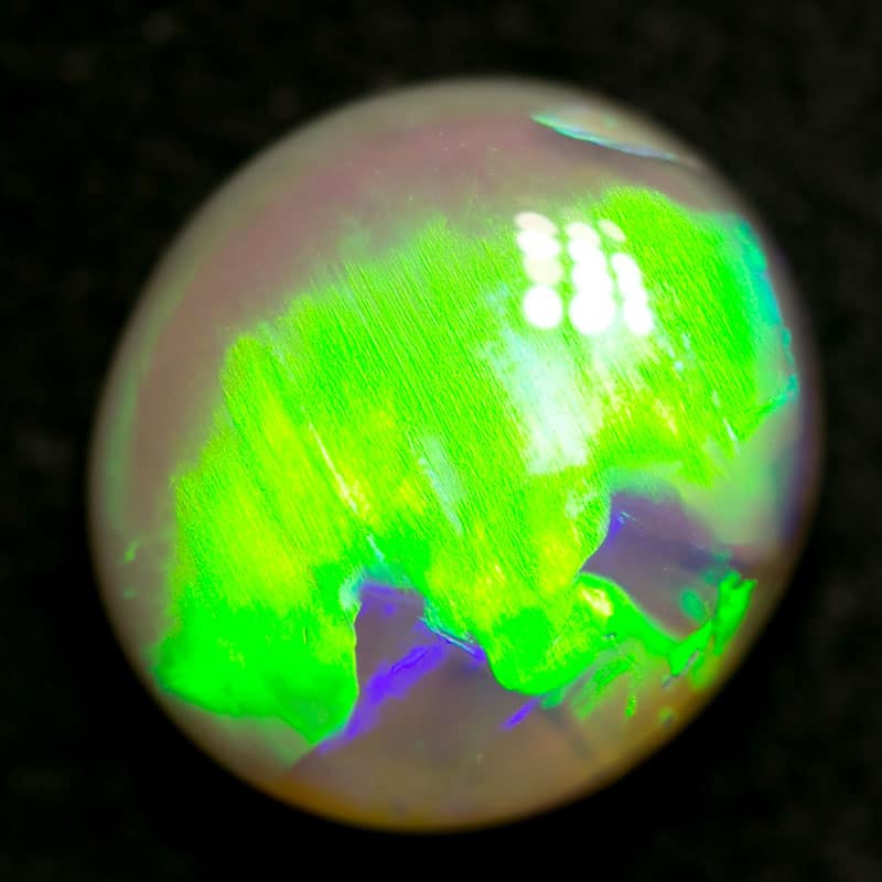2.16 ct dark opal 9x8x5mm