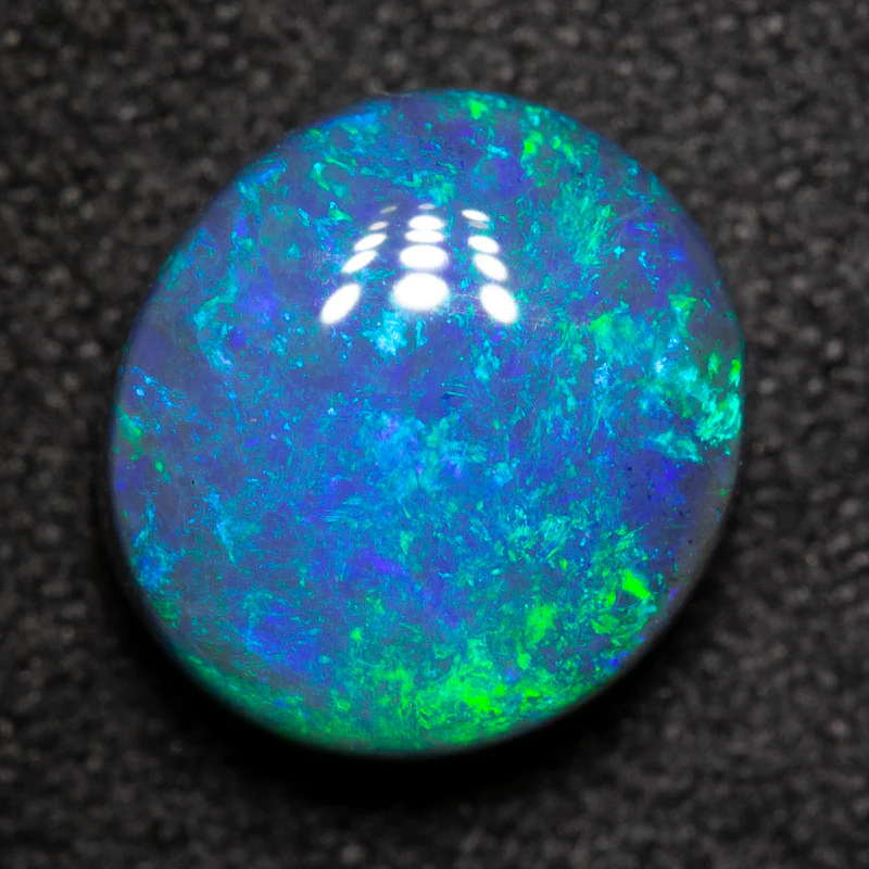 2.17 ct black opal 9.1x8.3x4.5mm