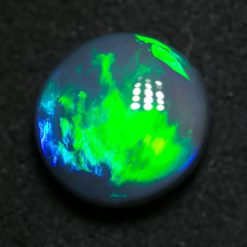 2.17 ct black opal gem 9x6.5x3.5mm