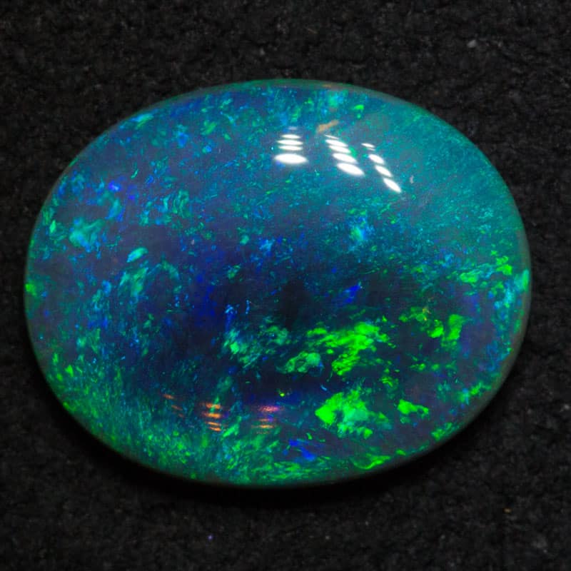 2.21 ct dark opal 11.5x9.5x3mm