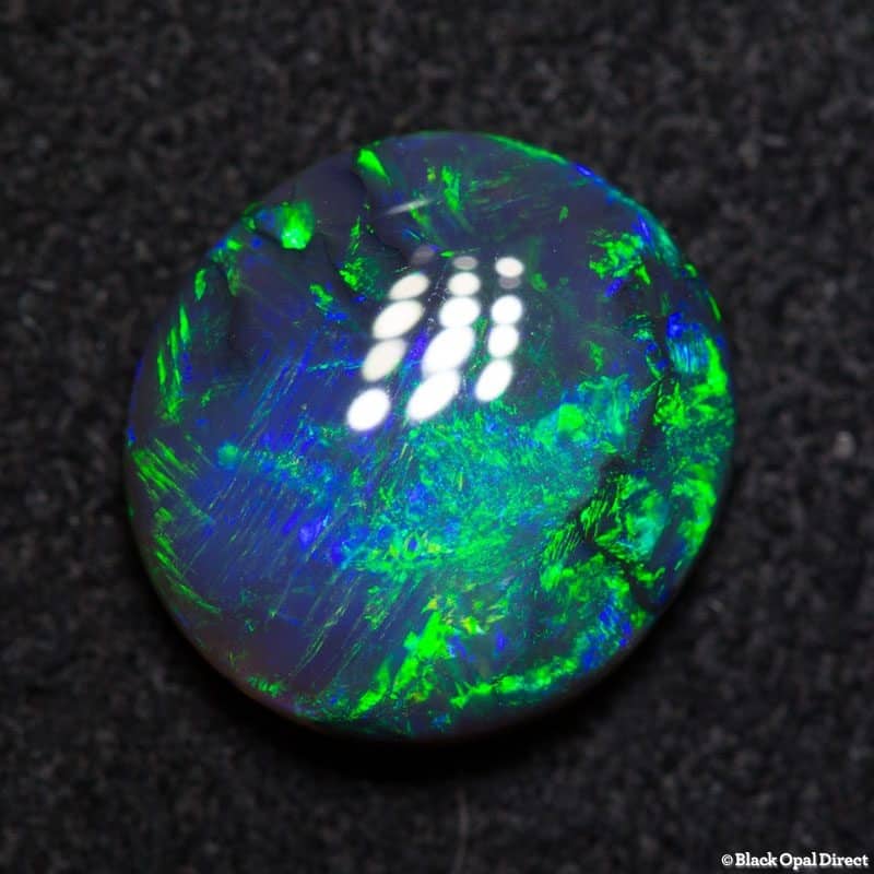 2.24 ct black opal 10x9.5x3.5mm