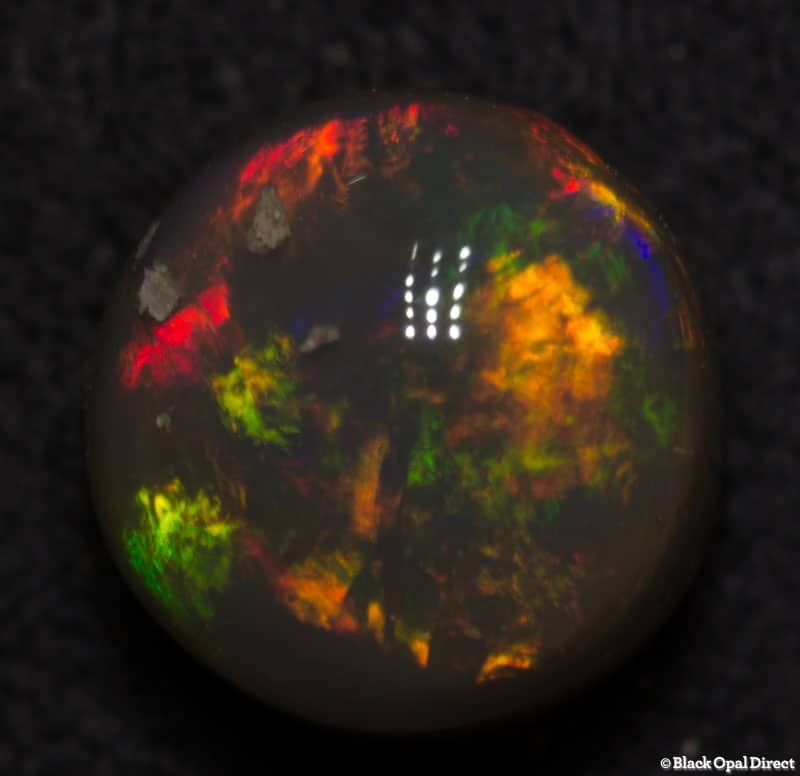 2.24 ct black opal 7.5mm round x6mm