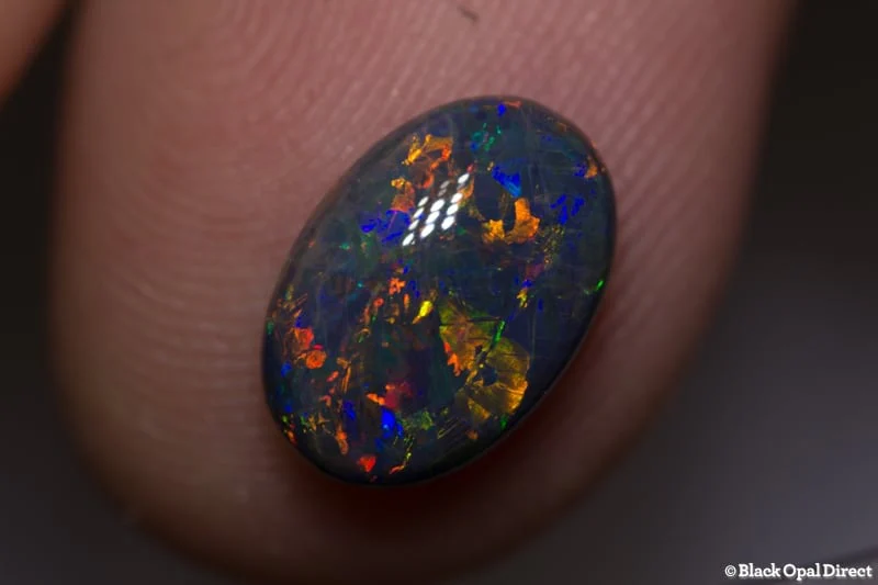2.24 ct double sided black opal gem 11.5x5x4mm