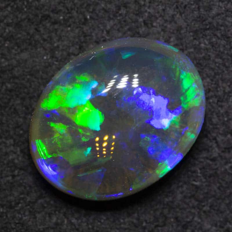2.25 ct black crystal opal 10.1x8.1x4.5mm