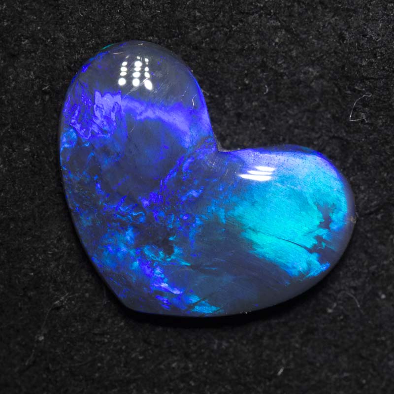 2.25 ct black opal 13.3x9.8x2.9mm