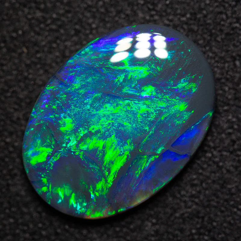 2.26 ct black opal 13.1x9.6x2.7mm
