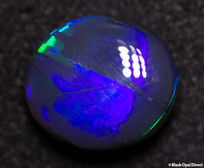 2.27 ct black opal 10x9x4.5mm
