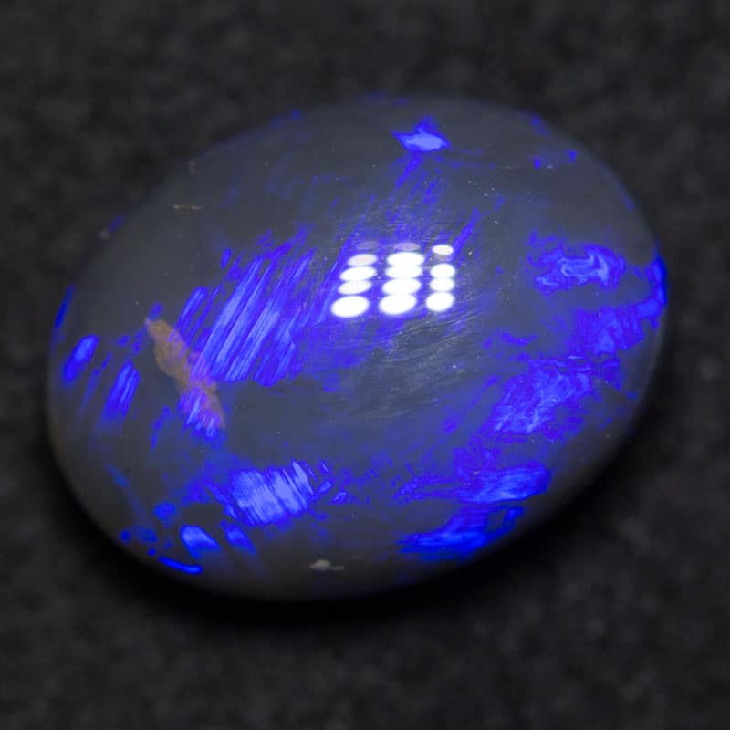 2.31 ct black opal 10.1x7.7x4.9mm