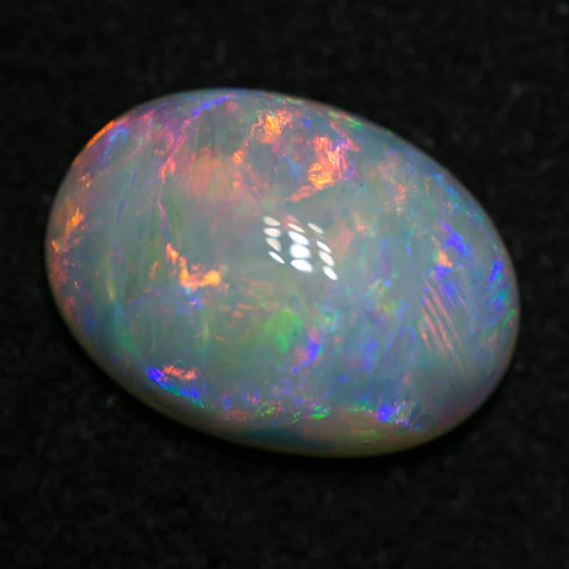 2.34 ct double sided white opal 11x8x4mm