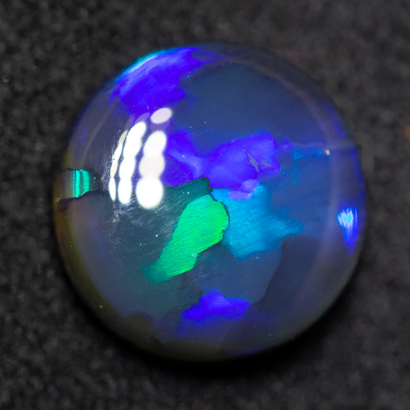 2.35 ct black opal 9.3x9.1x4.1mm