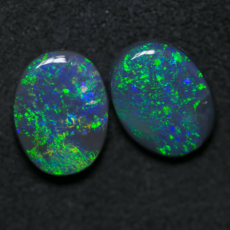 2.36 ct black opal pair 9x7mm