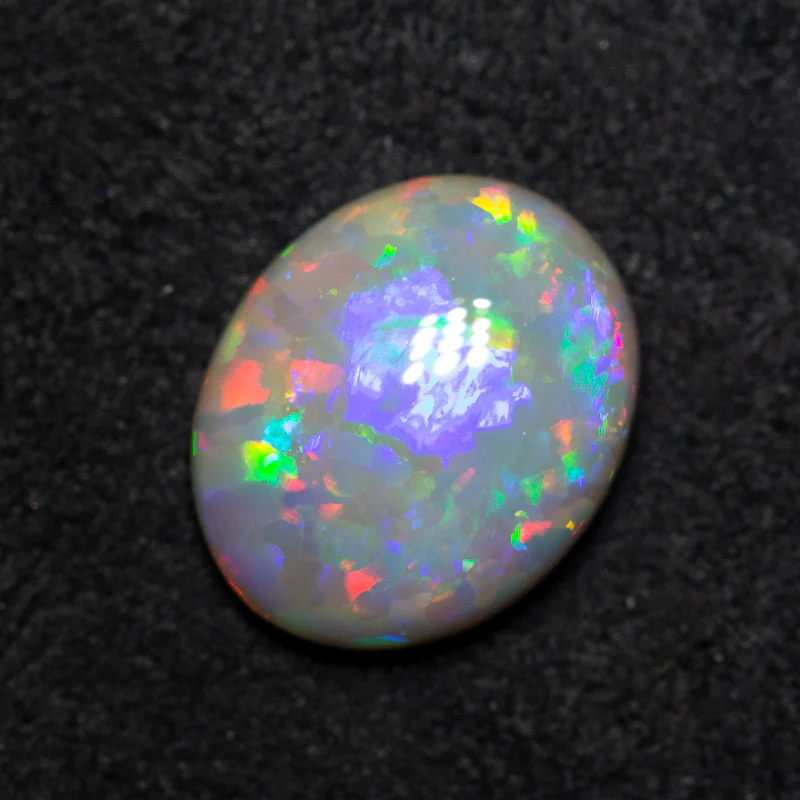 2.36 ct dark opal 10.7x8.7x3.9mm