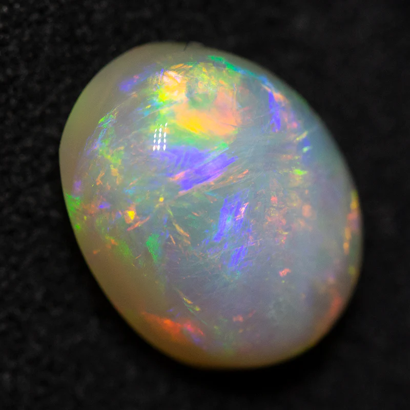 2.42 ct white opal 9.7x7.7x5.3mm
