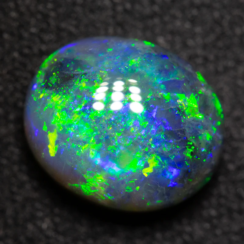 2.43 ct black opal 9.3x8x5mm