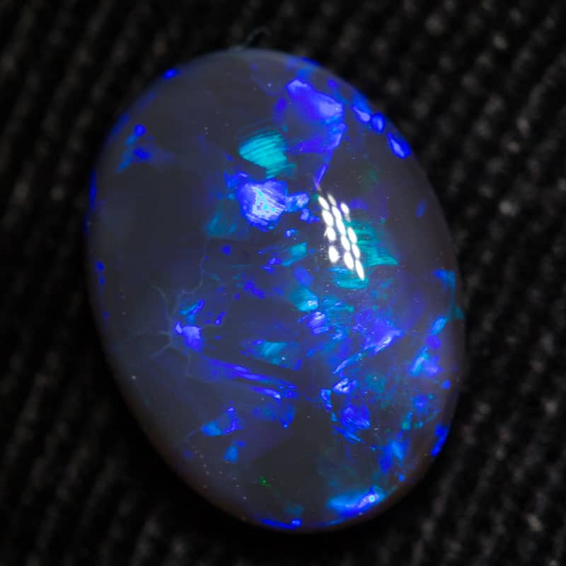 2.44 ct black opal 11x8.2x4.5mm