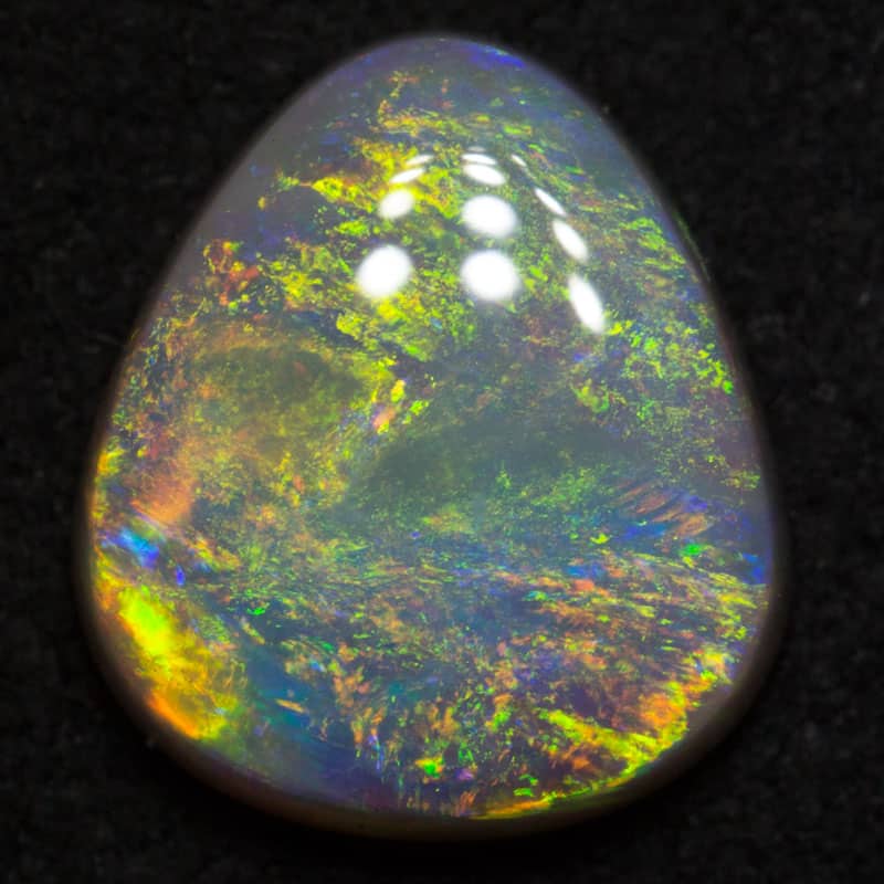 2.44 ct dark opal 10.4x9.1x3.6mm