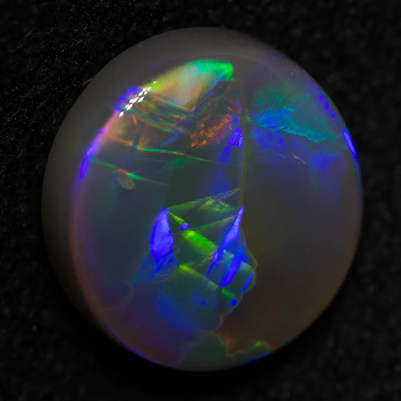 2.44 ct dark opal 9.8x9.3x4.1mm