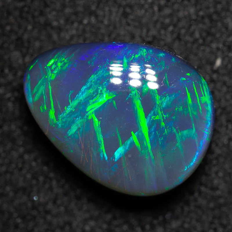 2.45 ct black opal 10.3x7.9x4.8mm