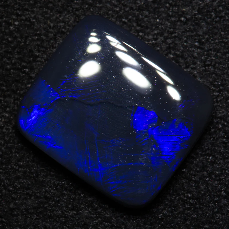 2.46 ct black opal 10.6x9.4x2.7mm